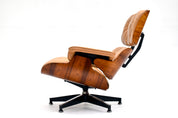 Eames_Lounge_Chair_and_Ottoman_by_Charles_&_Ray_Eames_for_Herman_Miller,_Rosewood_&_Butterscotch_Leather,_1960s