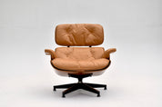 Eames_Lounge_Chair_and_Ottoman_by_Charles_&_Ray_Eames_for_Herman_Miller,_Rosewood_&_Butterscotch_Leather,_1960s