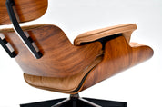 Eames_Lounge_Chair_and_Ottoman_by_Charles_&_Ray_Eames_for_Herman_Miller,_Rosewood_&_Butterscotch_Leather,_1960s