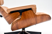 Eames_Lounge_Chair_and_Ottoman_by_Charles_&_Ray_Eames_for_Herman_Miller,_Rosewood_&_Butterscotch_Leather,_1960s
