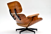 Eames_Lounge_Chair_and_Ottoman_by_Charles_&_Ray_Eames_for_Herman_Miller,_Rosewood_&_Butterscotch_Leather,_1960s