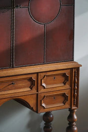 Otto_Schulz,_Swedish_Modern_Cabinet_in_Leather,_Oak_&_Brass_Nails,_1930s