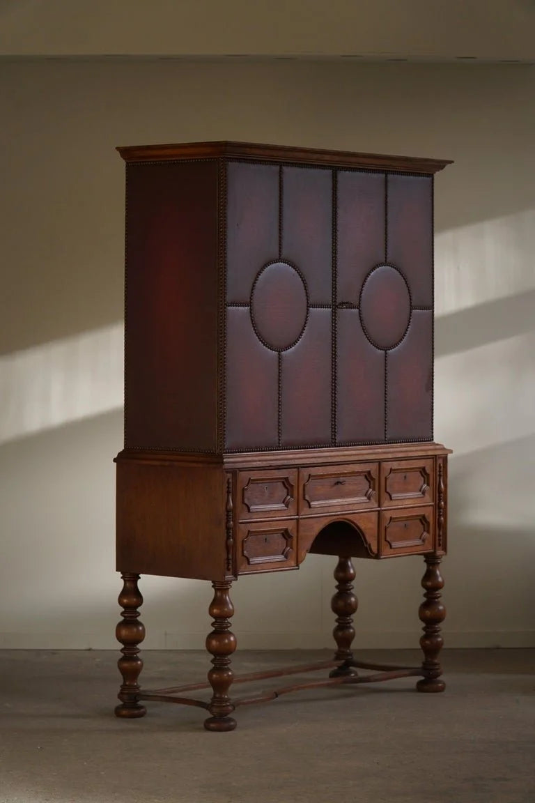 Otto_Schulz,_Swedish_Modern_Cabinet_in_Leather,_Oak_&_Brass_Nails,_1930s