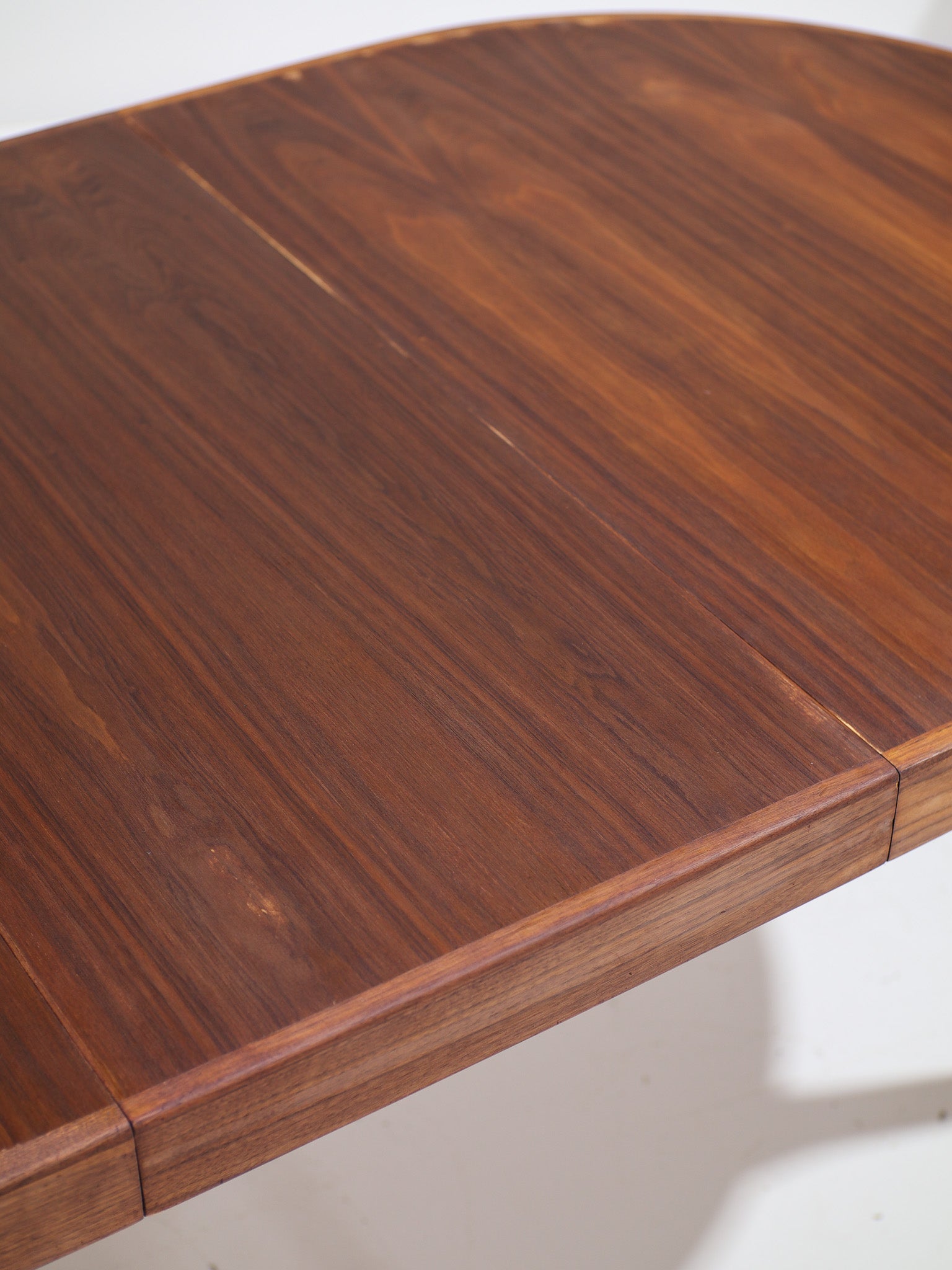 Danish_Teak_Oval_Extendable_Dining_Table,_1960s