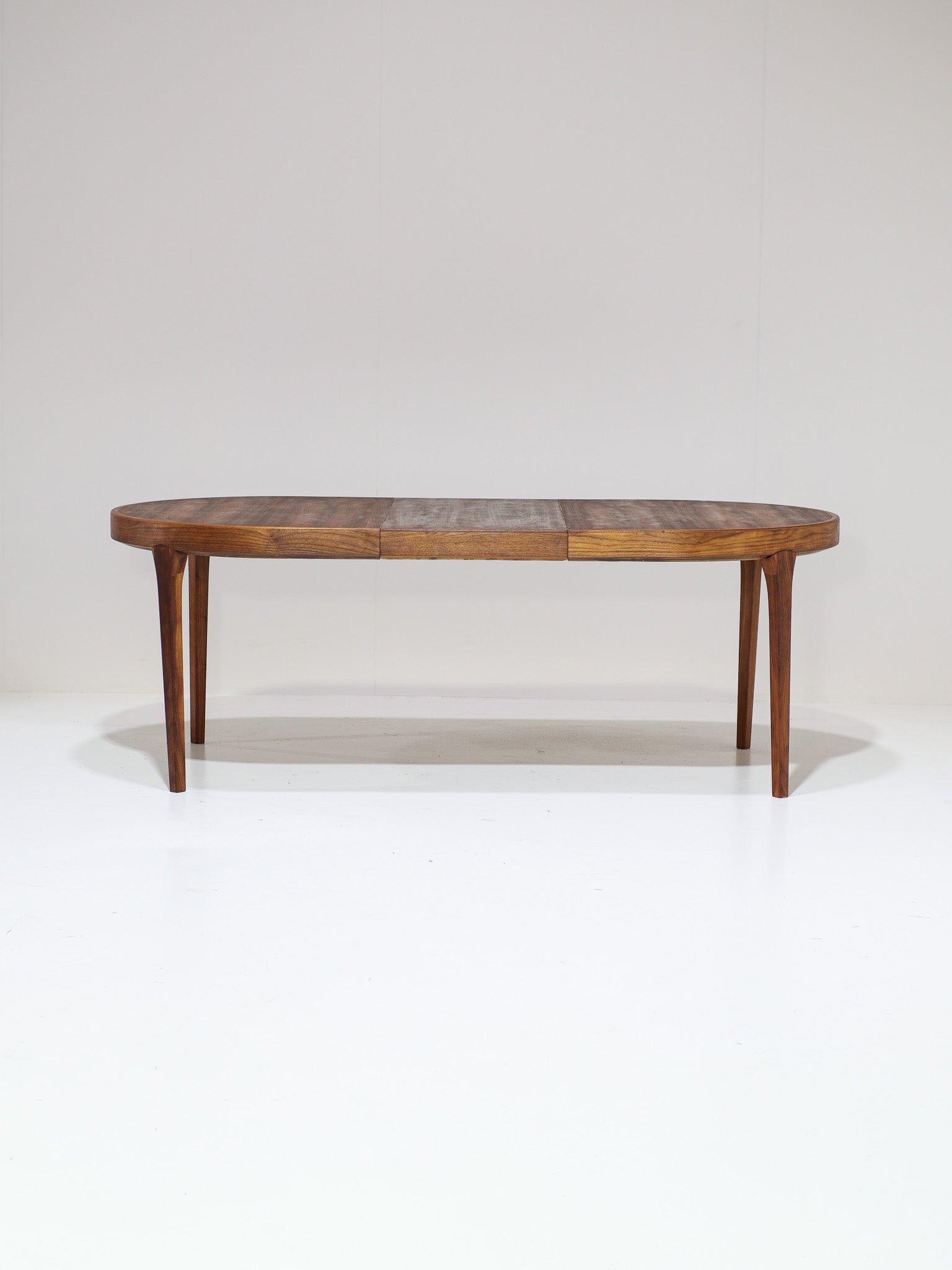 Danish_Teak_Oval_Extendable_Dining_Table,_1960s