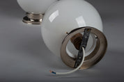 Set_of_2_Paavo_Tynell_Opaline_Glass_Sphere_Flush_Mount_Lamps,_1930s