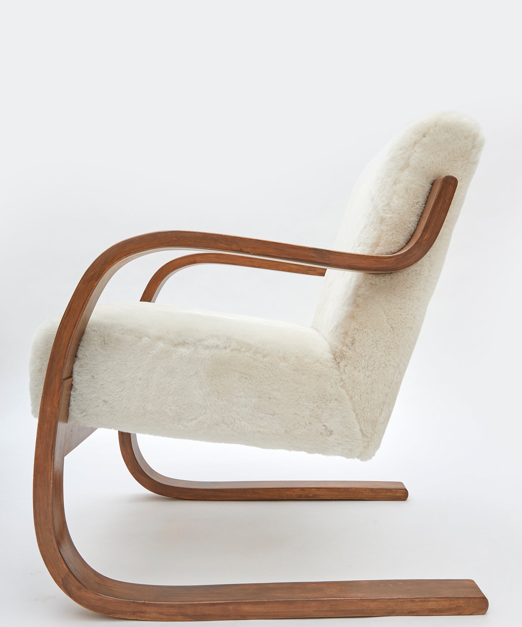 Set_of_2_Alvar_Aalto_Model_402_Armchairs_in_Shearling_and_Birch