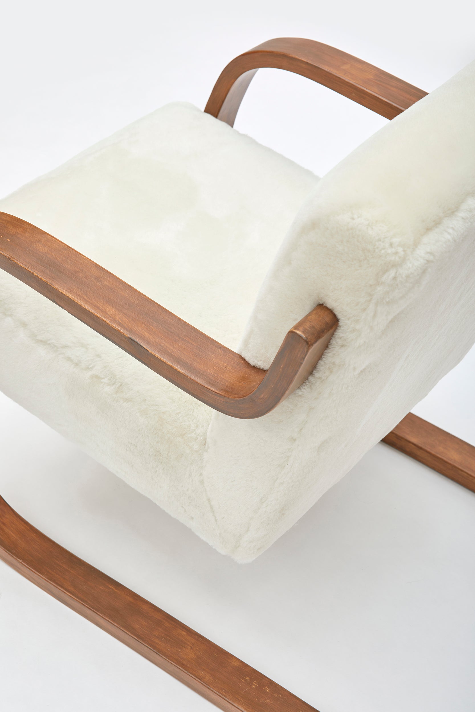 Set_of_2_Alvar_Aalto_Model_402_Armchairs_in_Shearling_and_Birch