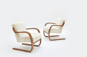 Set_of_2_Alvar_Aalto_Model_402_Armchairs_in_Shearling_and_Birch