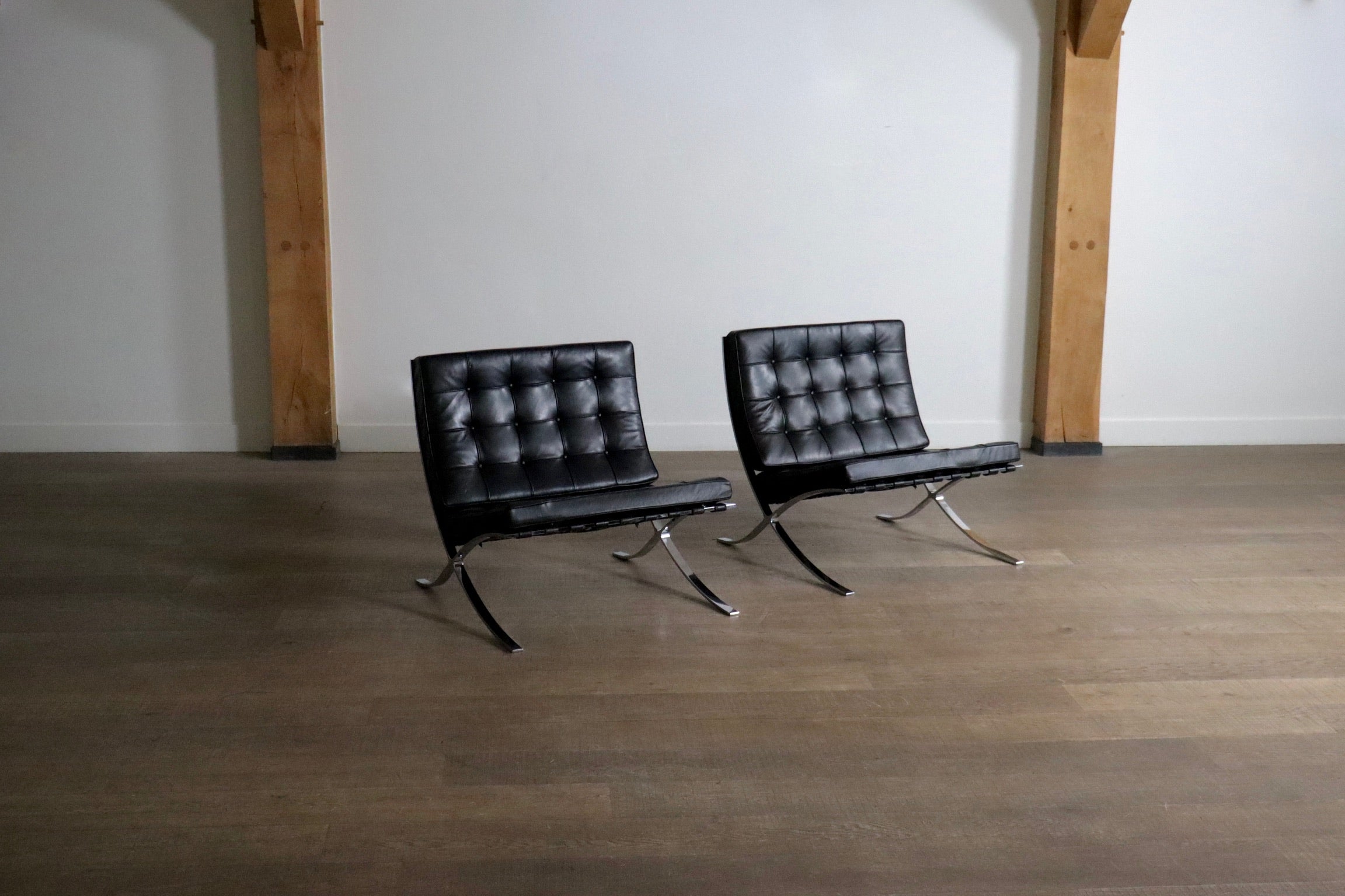 Set_of_2_Barcelona_Chairs_by_Ludwig_Mies_van_der_Rohe_for_Knoll,_1960s