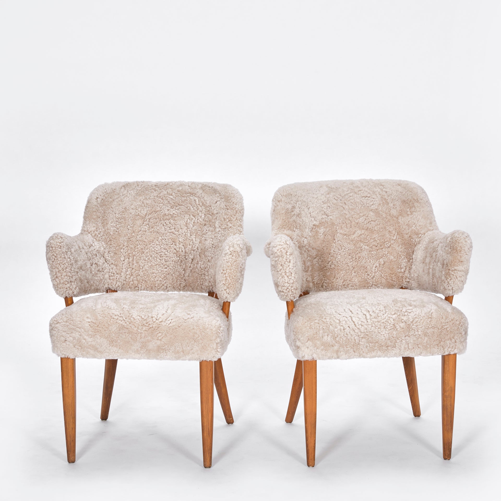 Set_of_2_Carl_Malmsten_Lata_Greven_Lounge_Chairs_in_Sheepskin,_1953