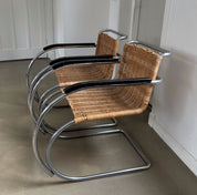 Set_of_2_Bauhaus_Rattan_and_Chrome_Tubular_Steel_Lounge_Chairs,_in_the_Style_of_Ludwig_Mies_van_der_Rohe
