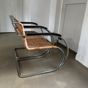 Set_of_2_Bauhaus_Rattan_and_Chrome_Tubular_Steel_Lounge_Chairs,_in_the_Style_of_Ludwig_Mies_van_der_Rohe