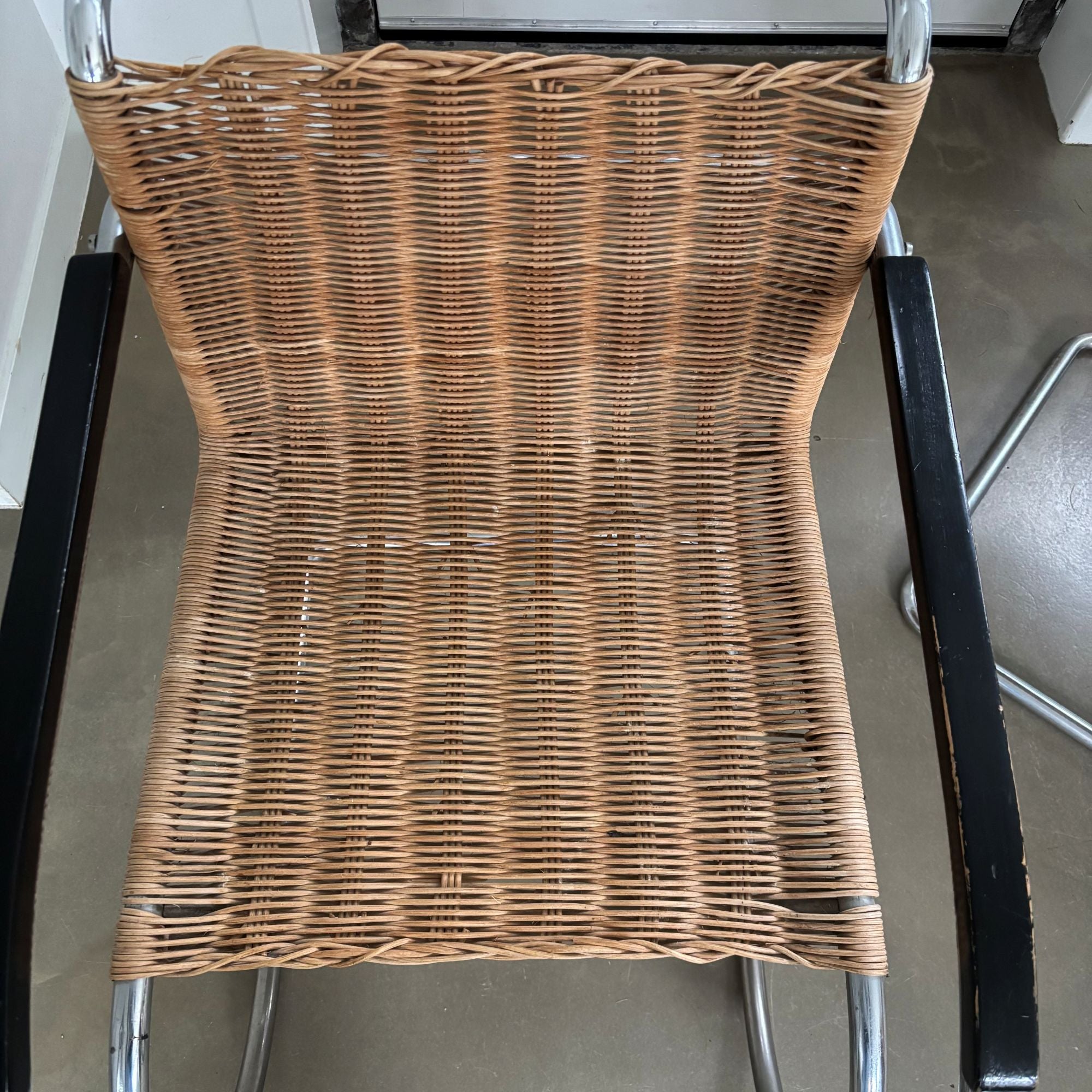 Set_of_2_Bauhaus_Rattan_and_Chrome_Tubular_Steel_Lounge_Chairs,_in_the_Style_of_Ludwig_Mies_van_der_Rohe