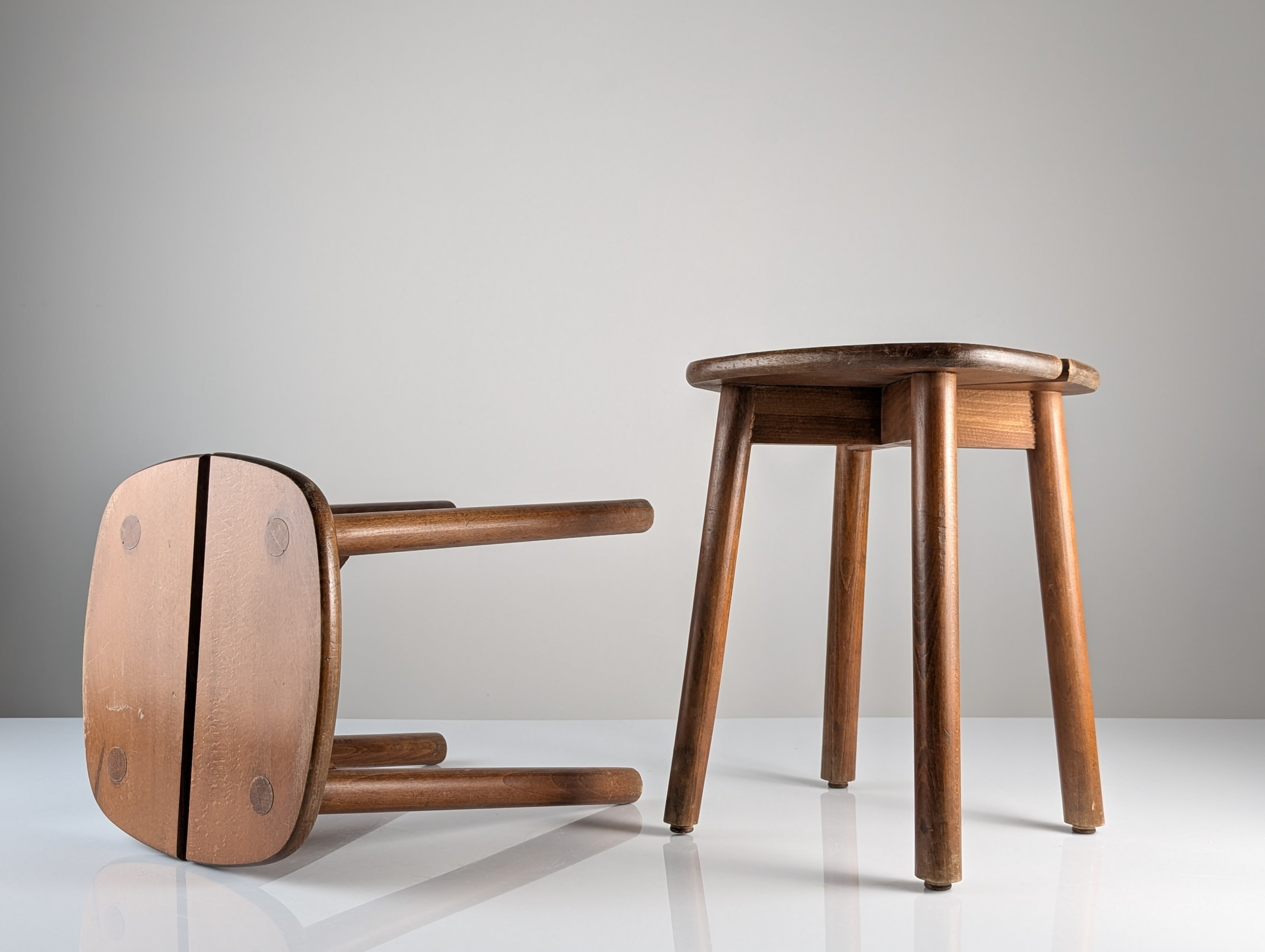 Set_of_2_Wooden_Stools_by_Pierre_Gautier-Delaye,_French_Mid_Century_Design,_1960s