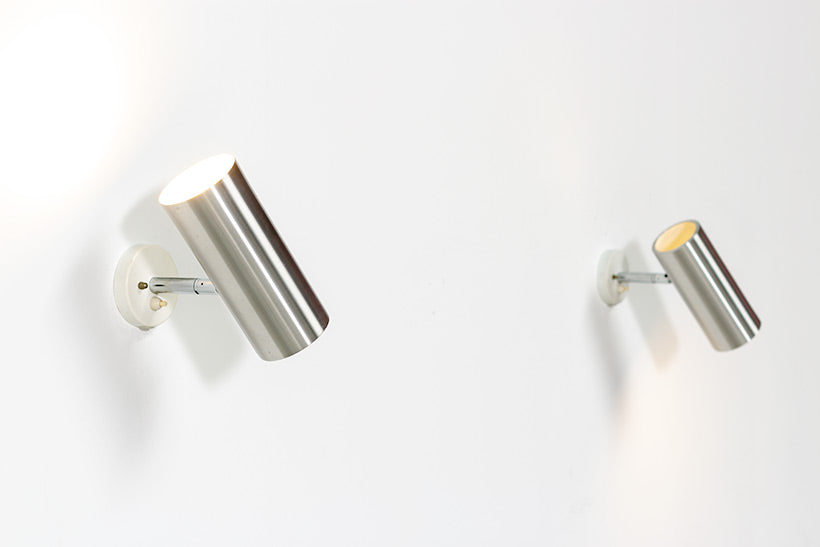 Set_of_2_Raak_modernist_brushed_metal_cylinder_sconces_circa_1970