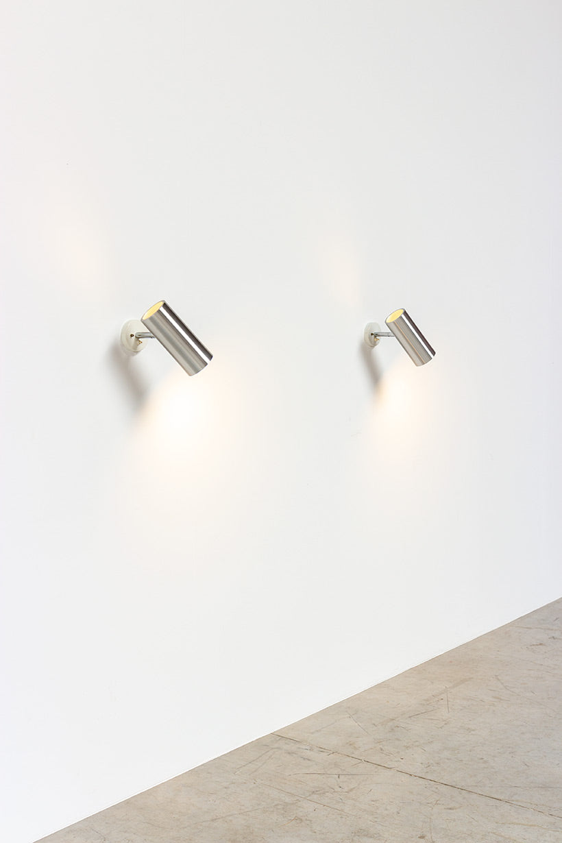 Set_of_2_Raak_modernist_brushed_metal_cylinder_sconces_circa_1970