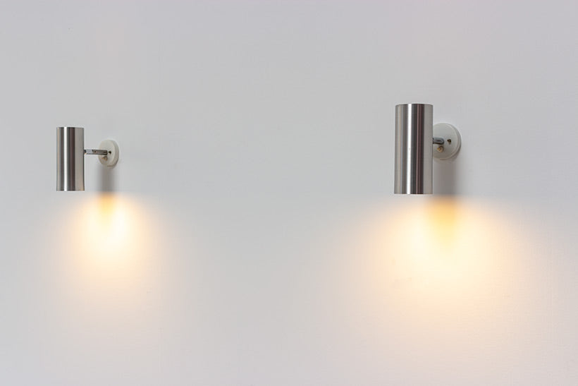 Set_of_2_Raak_modernist_brushed_metal_cylinder_sconces_circa_1970