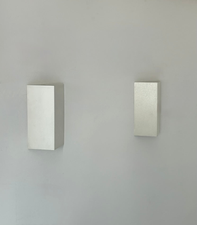 Set_of_2_Folded_Matte_White_Metal_Wall_Lights,_France,_1970s