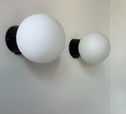 Set_of_2_RAAK_Opaline_and_Bakelite_Wall_Sconces,_Dutch_Mid_Century_Modern_Lighting,_1970s