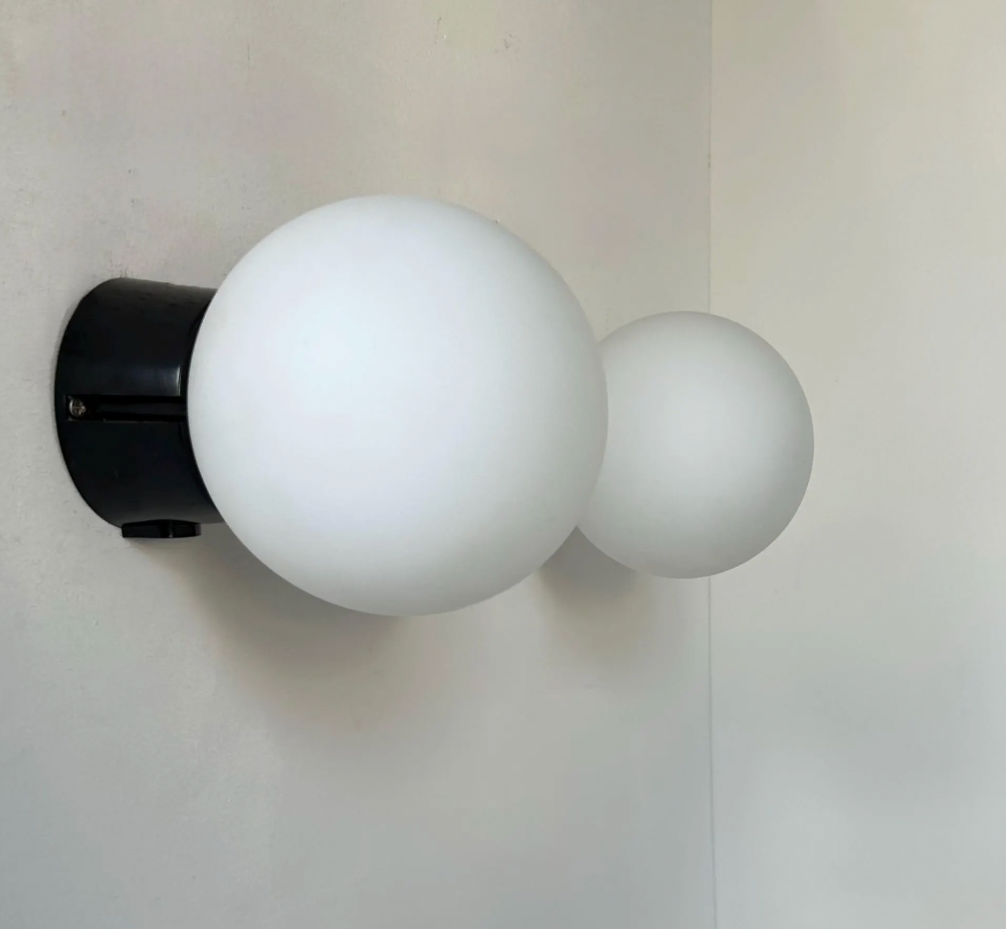Set_of_2_RAAK_Opaline_and_Bakelite_Wall_Sconces,_Dutch_Mid_Century_Modern_Lighting,_1970s