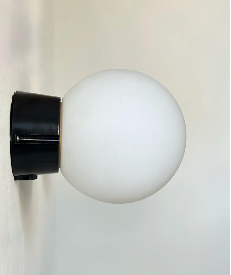 Set_of_2_RAAK_Opaline_and_Bakelite_Wall_Sconces,_Dutch_Mid_Century_Modern_Lighting,_1970s