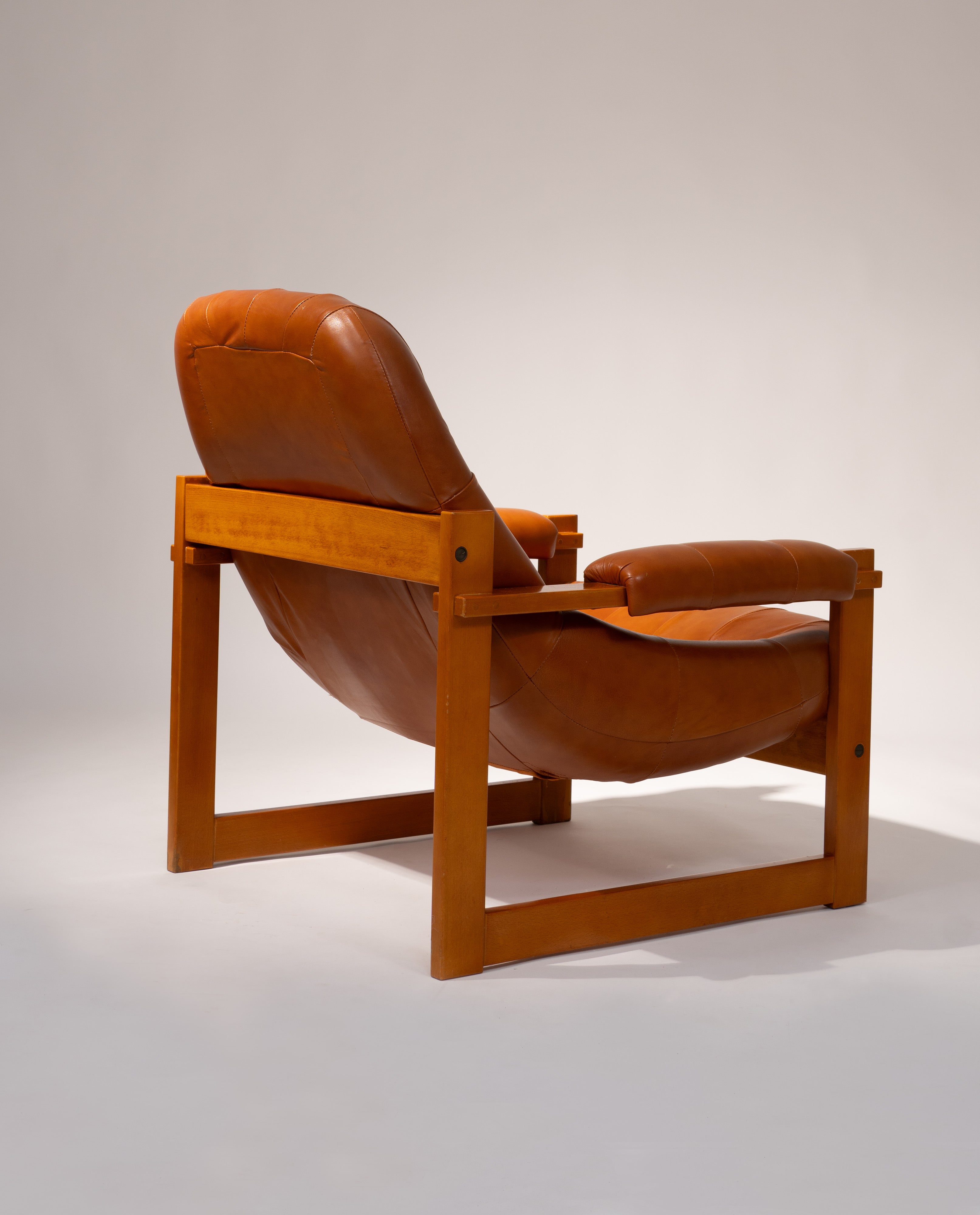 Percival_Lafer_MP-91_Armchair,_Jatobá_Wood_and_Brown_Leather,_1970