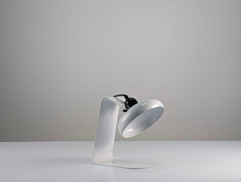 Postmodern_table_or_wall_lamp_by_Stilnovo