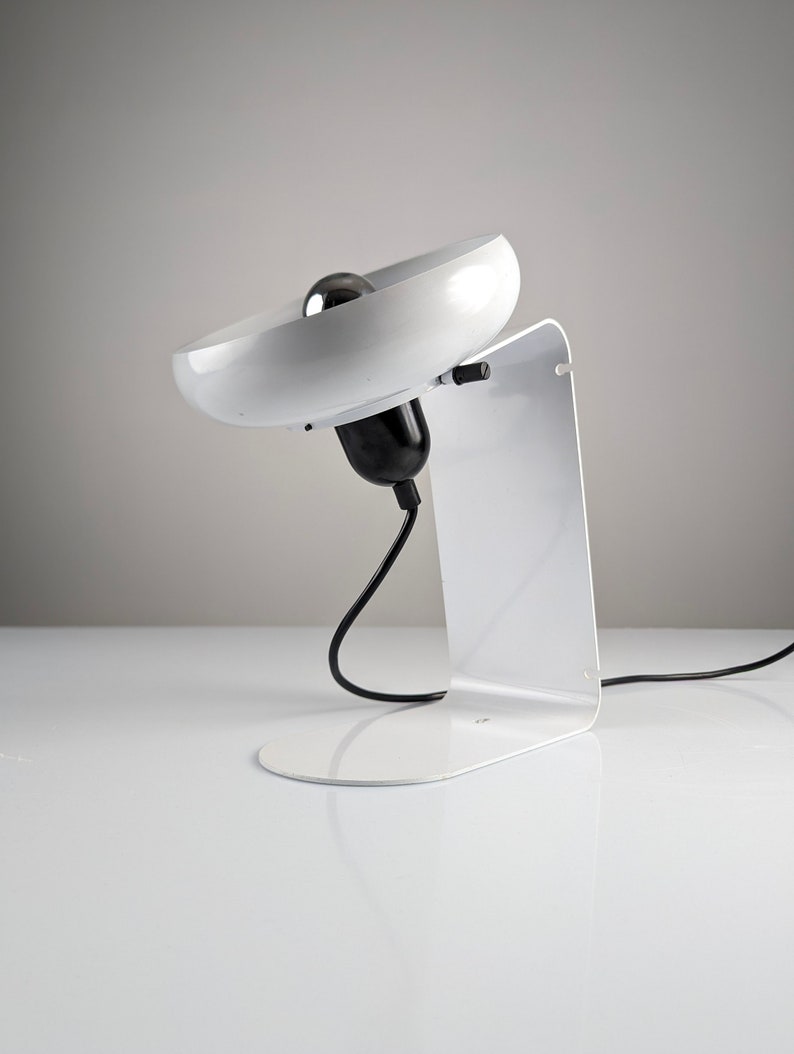 Postmodern_table_or_wall_lamp_by_Stilnovo