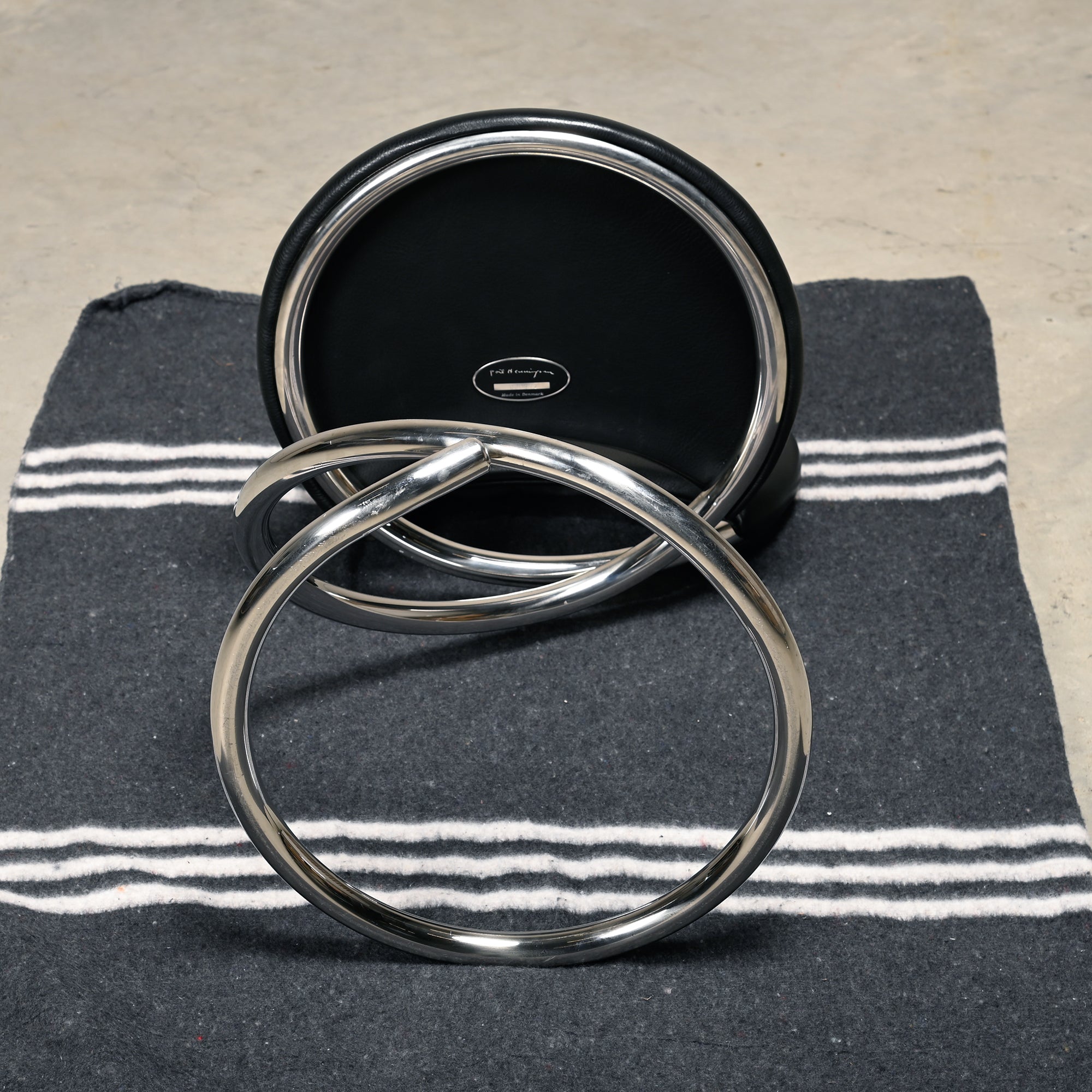 Set_of_PH-501_Snake_Chairs_by_Poul_Henningsen,_Chrome_&_Black_Leather,_Denmark