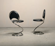 Set_of_PH-501_Snake_Chairs_by_Poul_Henningsen,_Chrome_&_Black_Leather,_Denmark