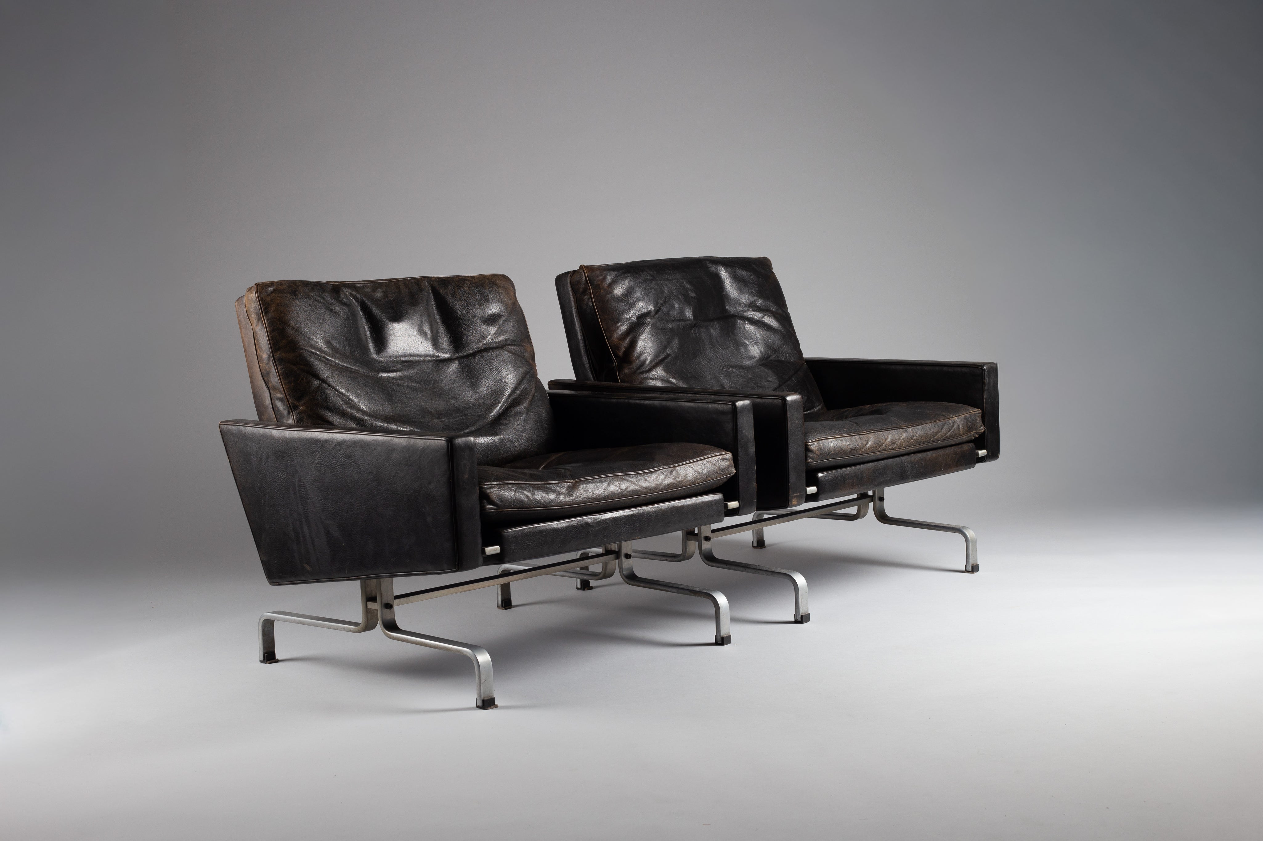 Set_of_2_Poul_Kjærholm_PK31_lounge_chairs_for_E._Kold_Christensen