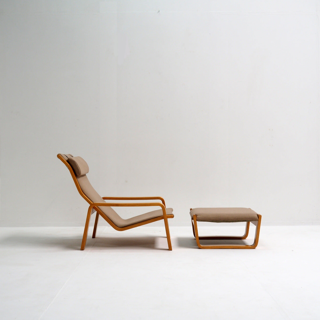 Set_of_Ilmari_Lappalainen_Lounge_Chair_with_Ottoman,_Finland_1963_(1980s_Production)