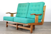 Rare_Guillerme_et_Chambron_solid_oak_sofa,_France_1960s