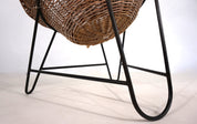 Rattan_basket_pod_lounge_chair,_1960
