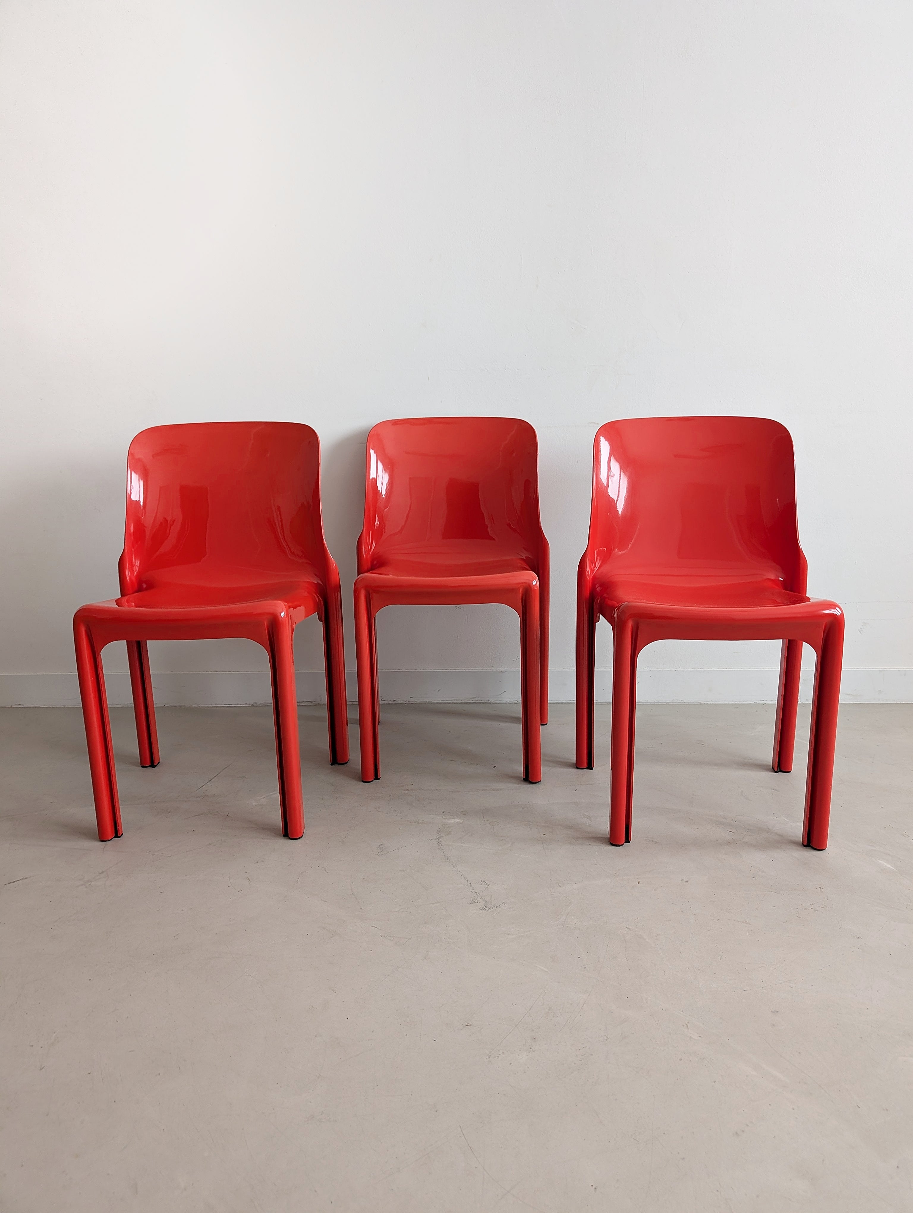 Set_of_Red_Selene_Table_and_3_chairs_by_Vico_Magistretti_for_Artemide,_1960s