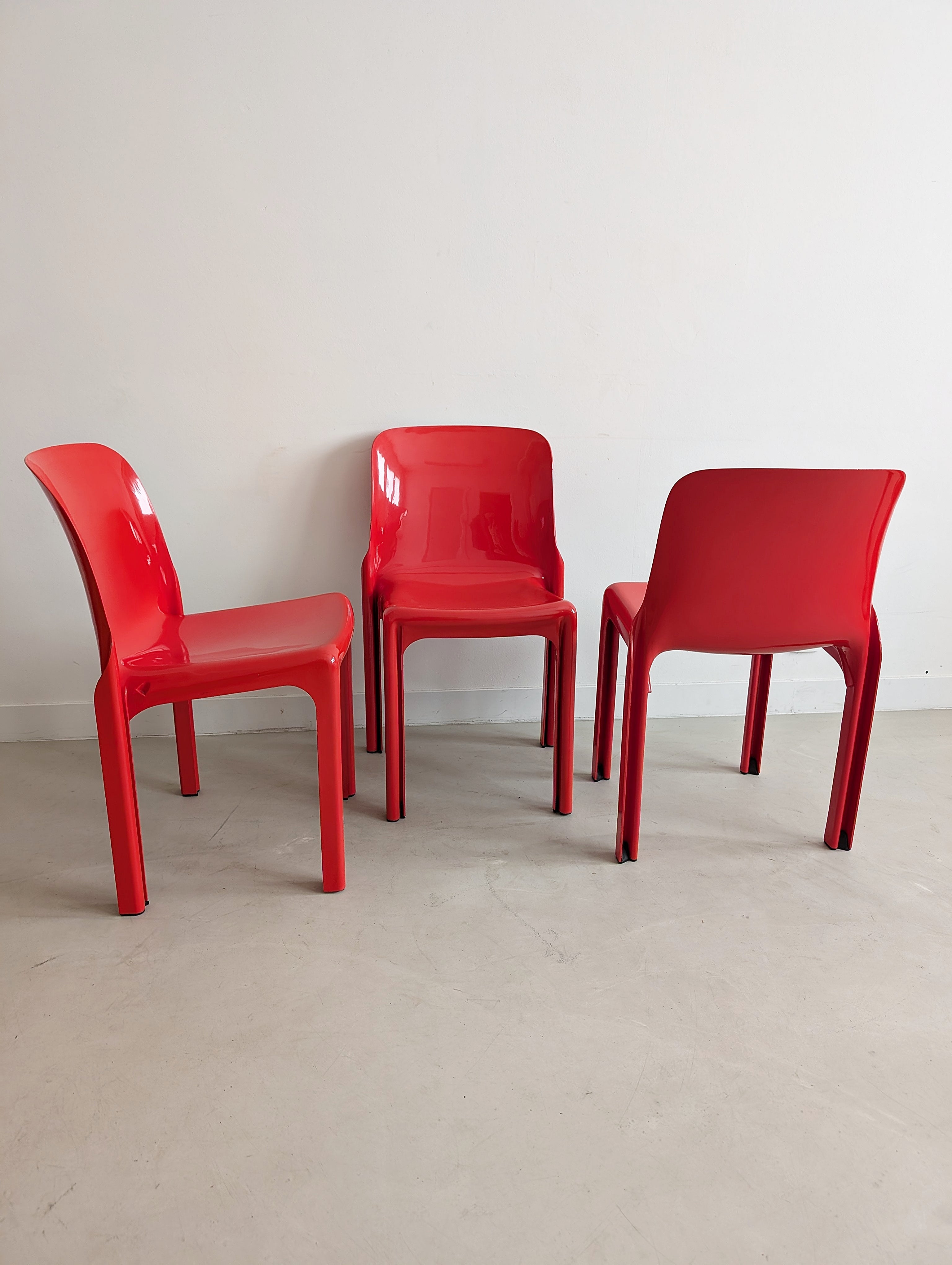 Set_of_Red_Selene_Table_and_3_chairs_by_Vico_Magistretti_for_Artemide,_1960s