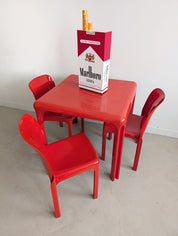Set_of_Red_Selene_Table_and_3_chairs_by_Vico_Magistretti_for_Artemide,_1960s
