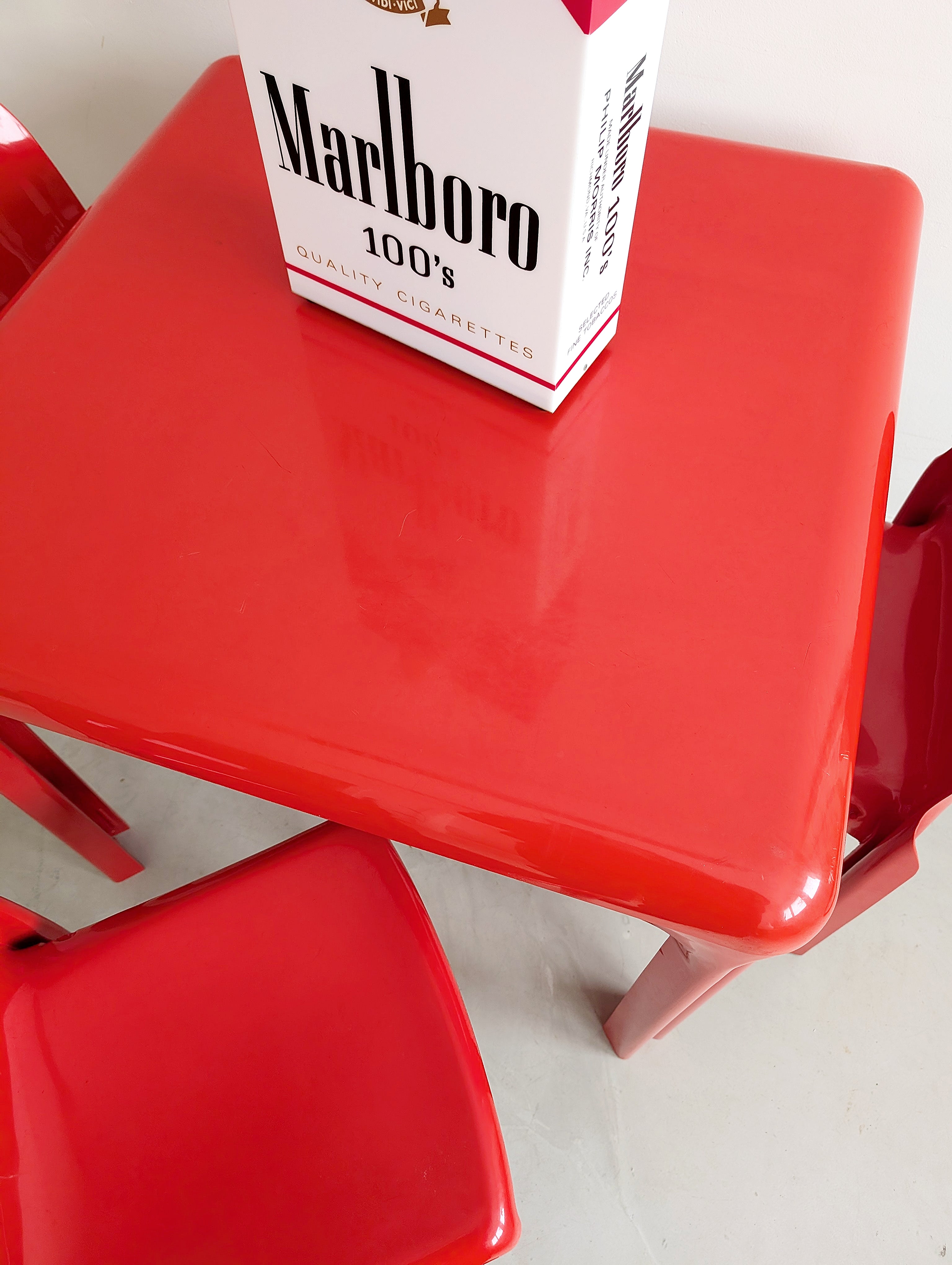 Set_of_Red_Selene_Table_and_3_chairs_by_Vico_Magistretti_for_Artemide,_1960s