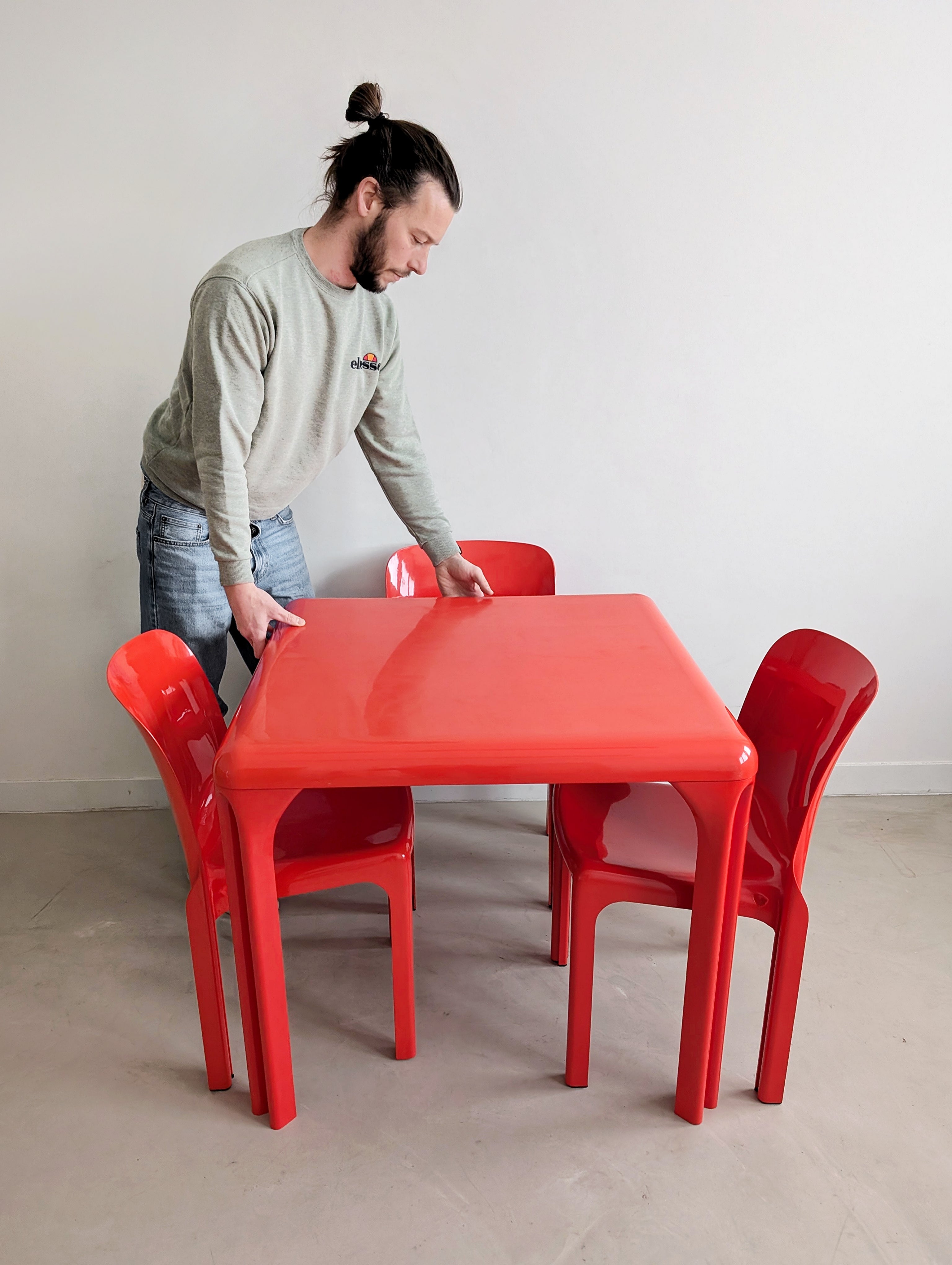 Set_of_Red_Selene_Table_and_3_chairs_by_Vico_Magistretti_for_Artemide,_1960s