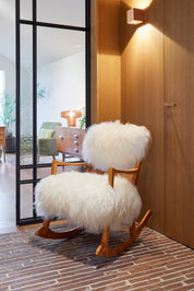 Carl_Malmsten_Rocking_Chair_in_Icelandic_Sheepskin,_1950s