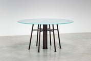 Round_Postmodern_dining_table_featuring_a_geometric_base_1980