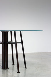 Round_Postmodern_dining_table_featuring_a_geometric_base_1980