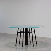 Round_Postmodern_dining_table_featuring_a_geometric_base_1980