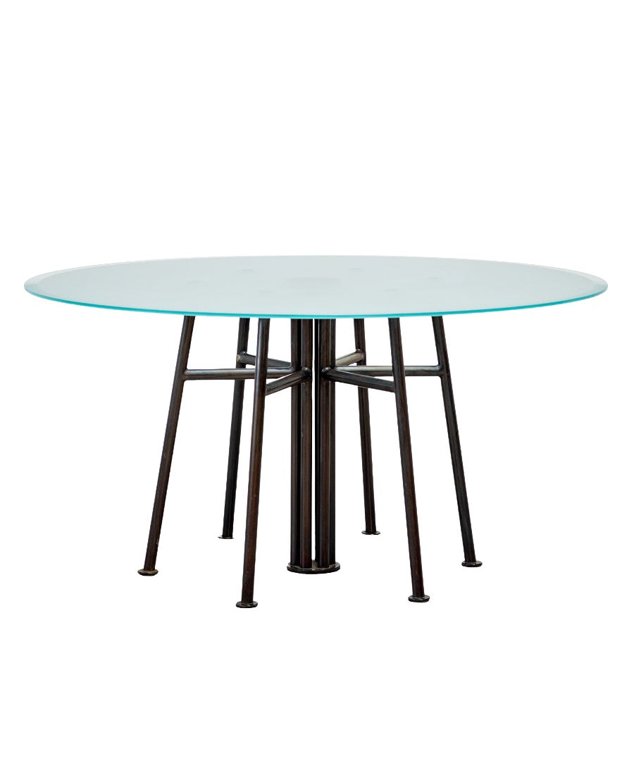 Round_Postmodern_dining_table_featuring_a_geometric_base_1980