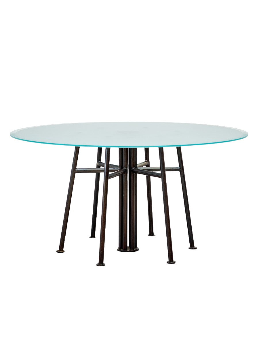 Round_Postmodern_dining_table_featuring_a_geometric_base_1980