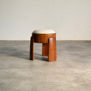 Sculptural_Ash_Wood_Stool_with_Dedar_Milano_Bouclé_Ivory_by_FORME