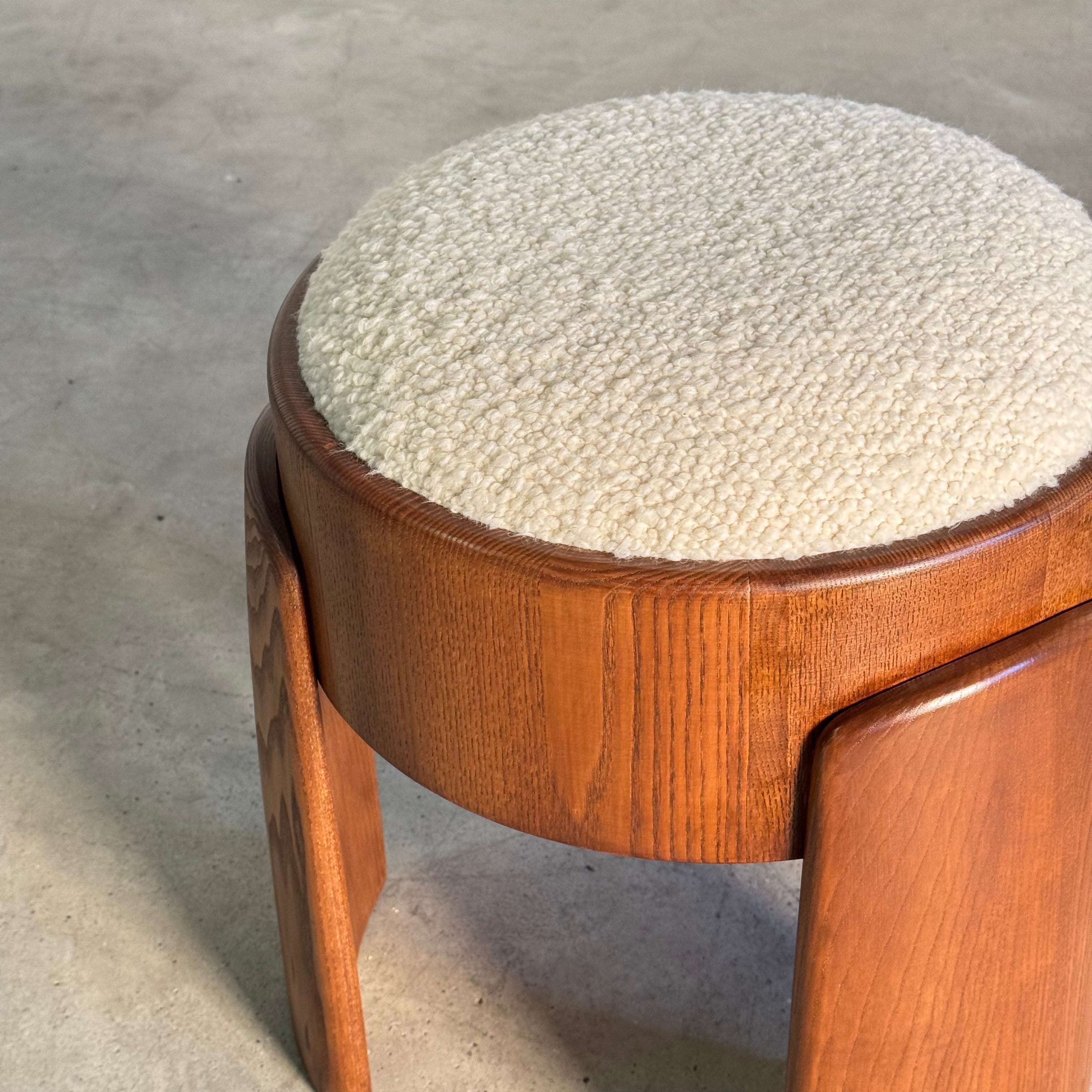 Sculptural_Ash_Wood_Stool_with_Dedar_Milano_Bouclé_Ivory_by_FORME