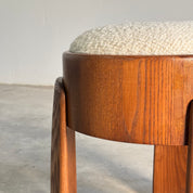 Sculptural_Ash_Wood_Stool_with_Dedar_Milano_Bouclé_Ivory_by_FORME