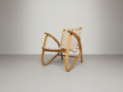 Functionalist_Bentwood_Lounge_Chair_by_Jan_Vaněk_with_Ivory_Woven_Straps,_Czechoslovakia,_1930s